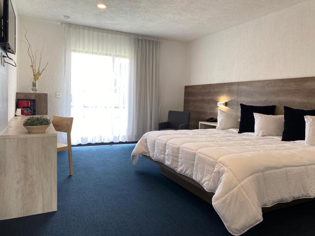 Hotel Aeropuerto Morelia Alvaro Obregon エクステリア 写真